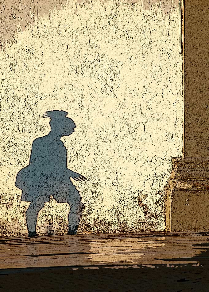 Shadow of a person on a wall