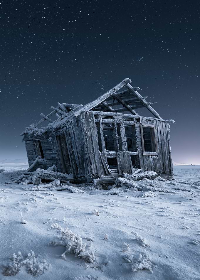 Abandoned Cabin under Starry Night