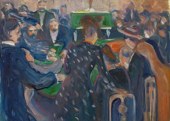People gathered around a green table