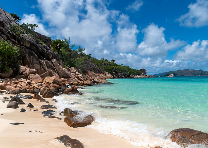 Tropical Beach with Turquoise Water and Rocks