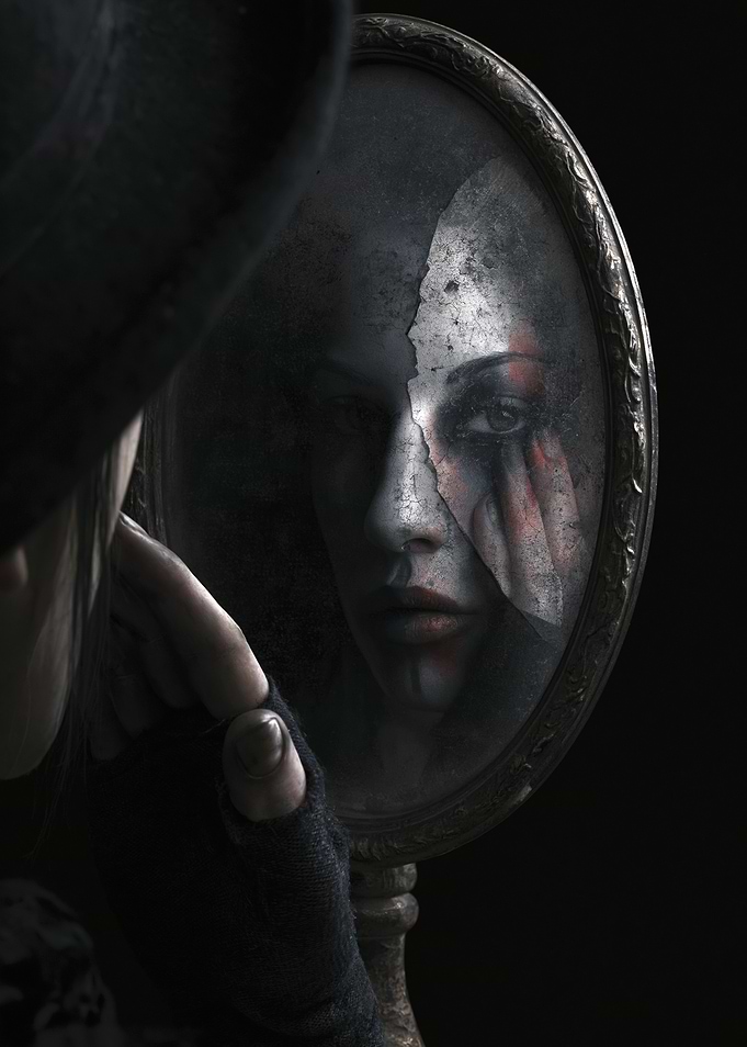 Woman's reflection in a cracked mirror