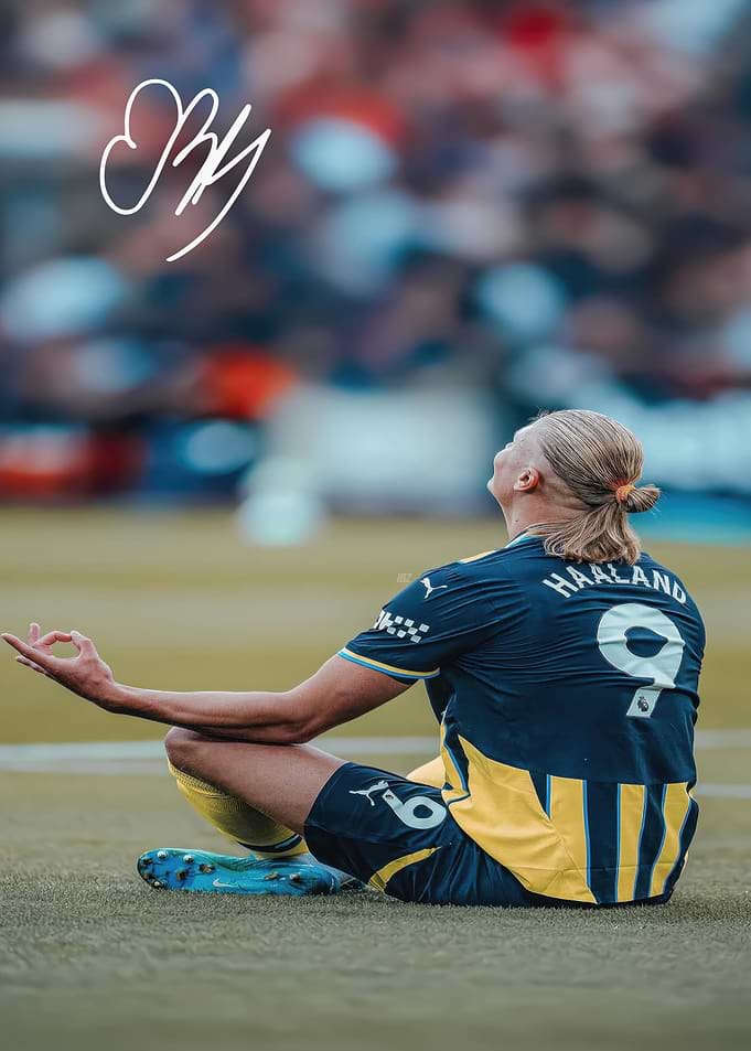 Erling Haaland meditating on field