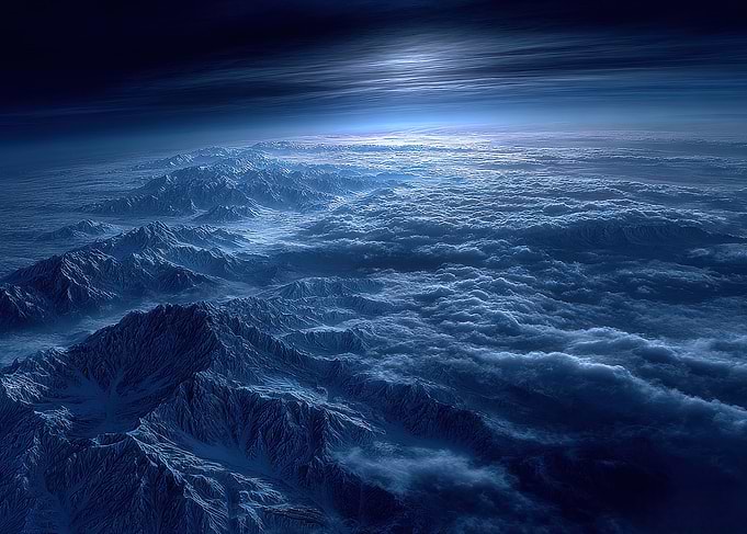 Celestial Glow Over Frozen Peaks