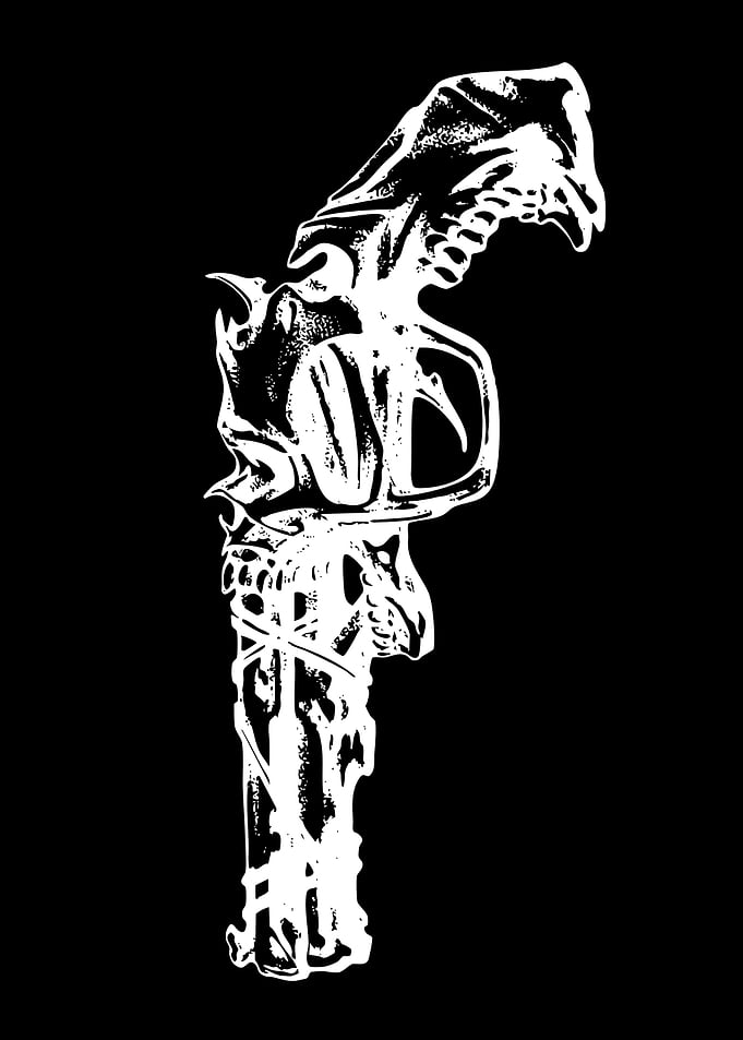 Gothic Revolver with Skull and Dragon Motifs