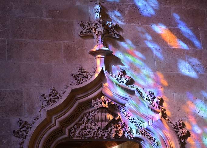 Stained Glass Light on Stone Archway