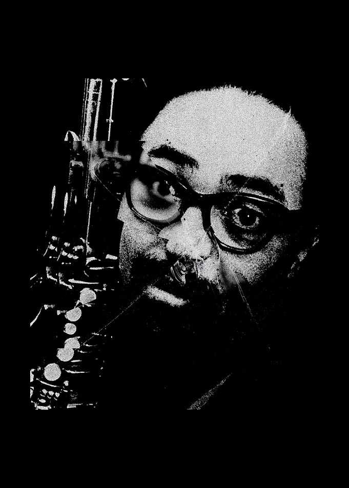 Close-up of a man with glasses and a saxophone