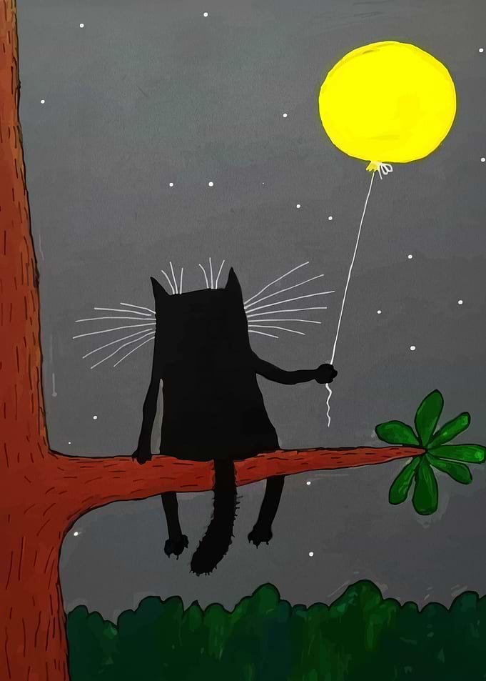 Black cat with balloon on tree