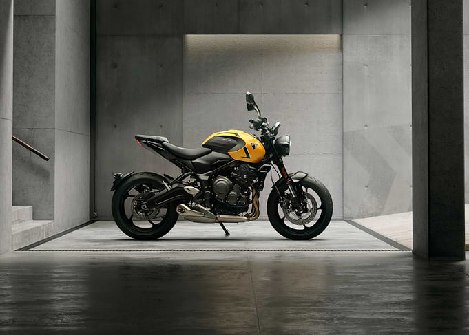 Yellow and black motorcycle in modern garage