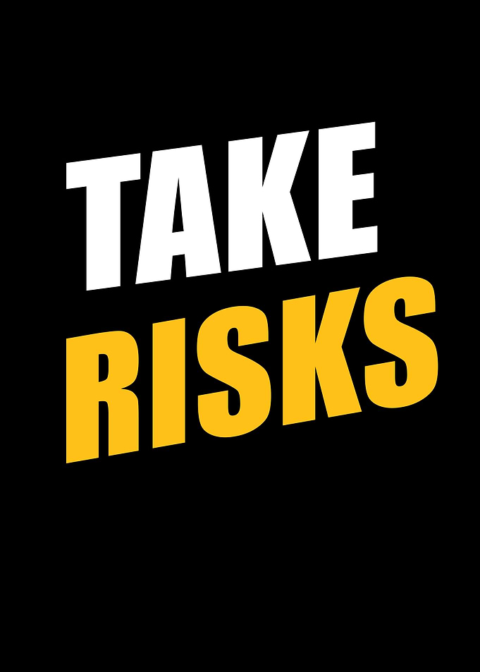 Take Risks motivational text