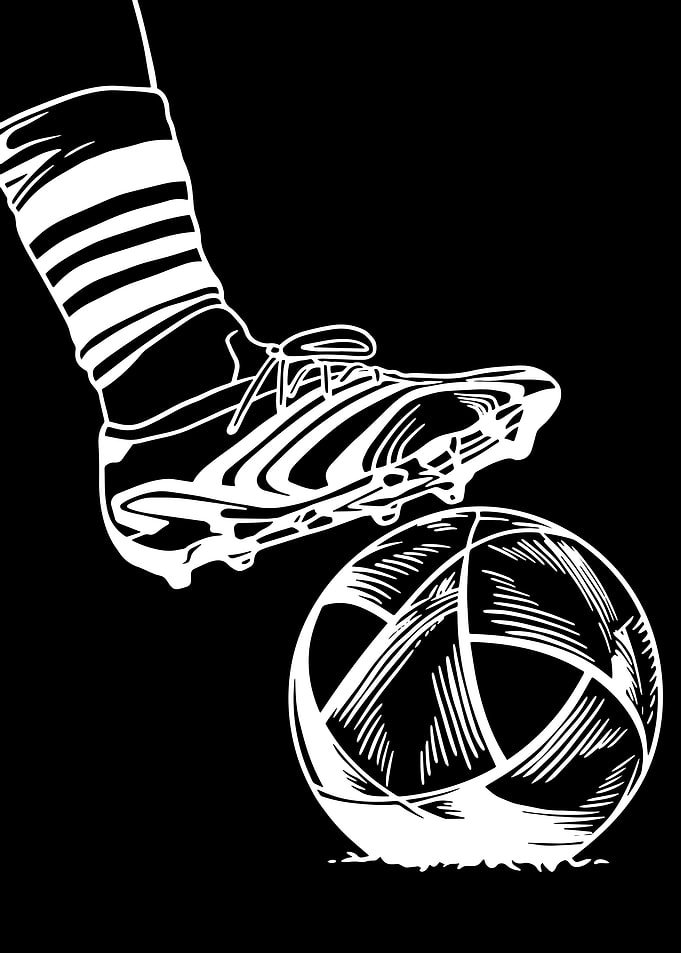 Soccer Player Kicking Ball