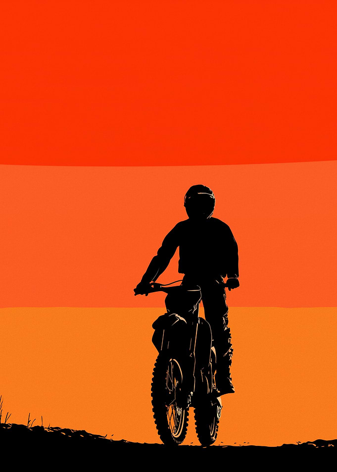 Motocross Rider Silhouette at Sunset