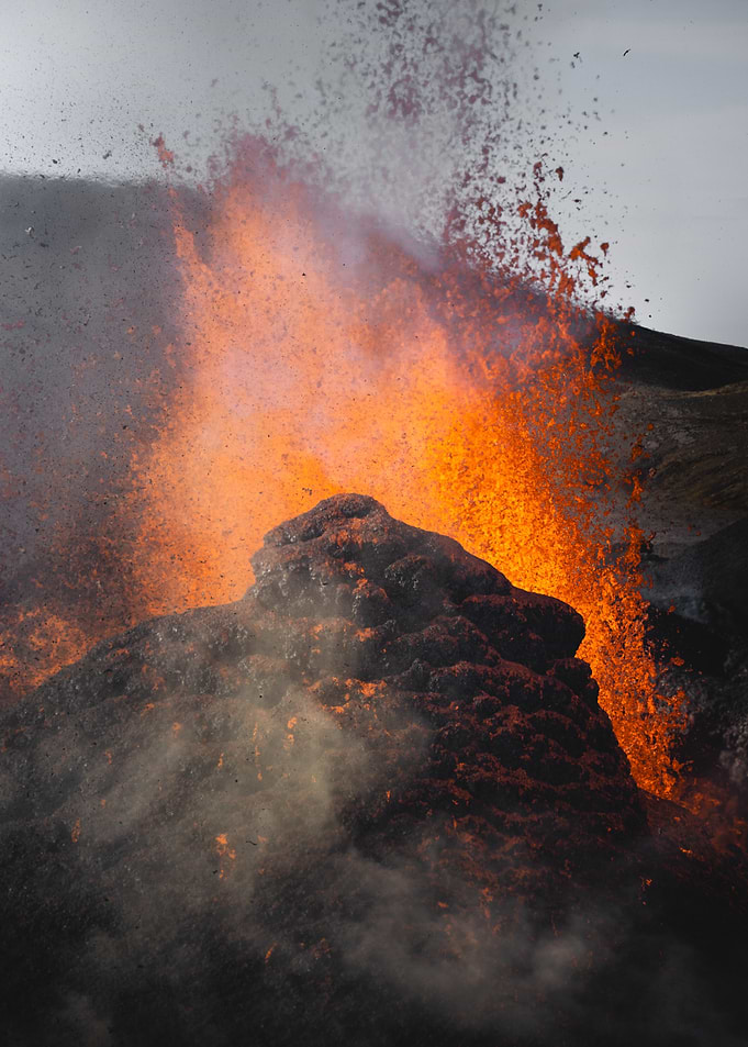 Volcanic eruption with lava spray