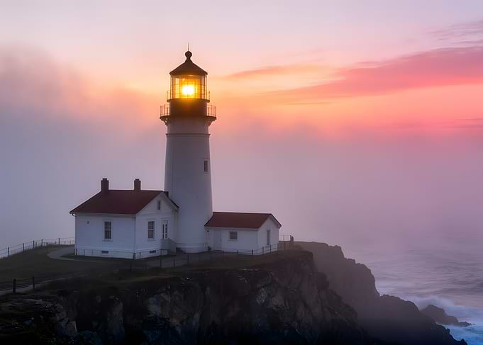 Lighthouse at Sunset with Fog