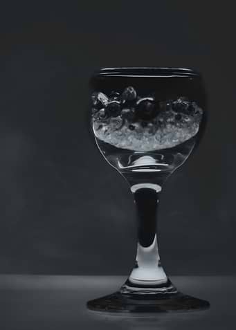 Glass of blueberries and ice
