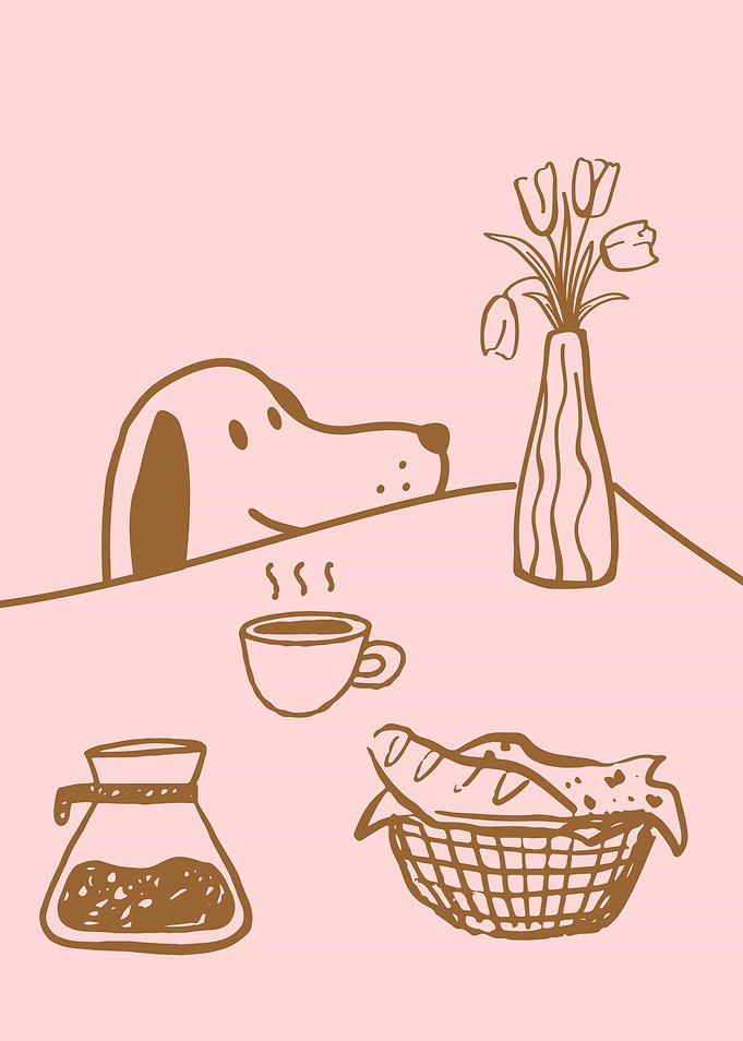 Dog looking at coffee and bread