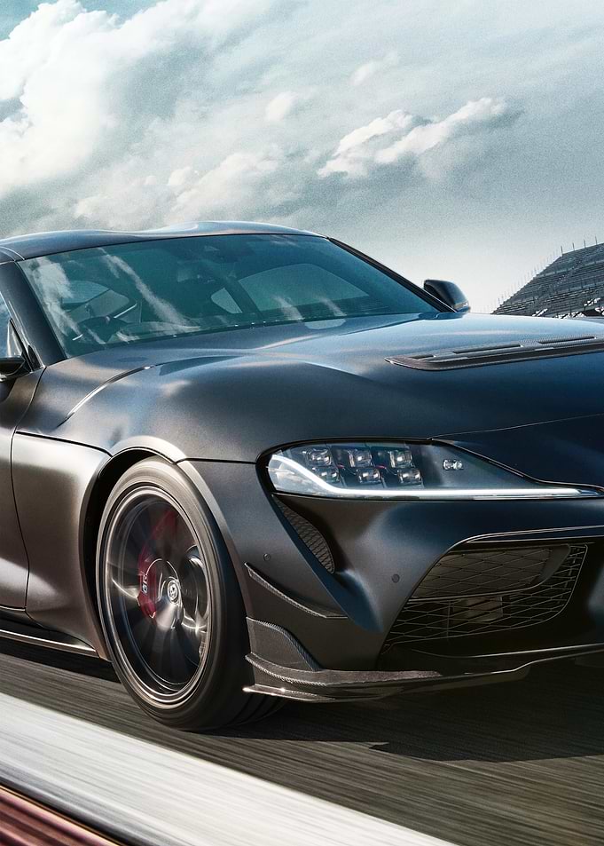 Matte Black Toyota Supra on Racetrack