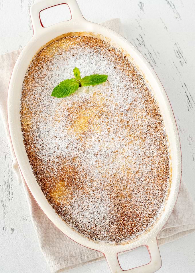 Baked Dessert with Powdered Sugar and Mint