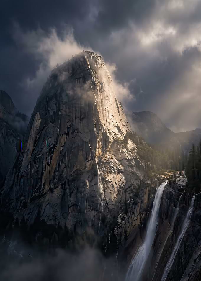 Dramatic Mountain Waterfall Under Stormy Skies
