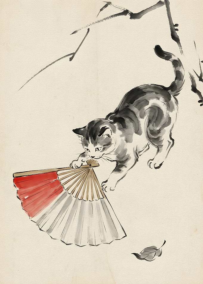 Cat playing with a fan