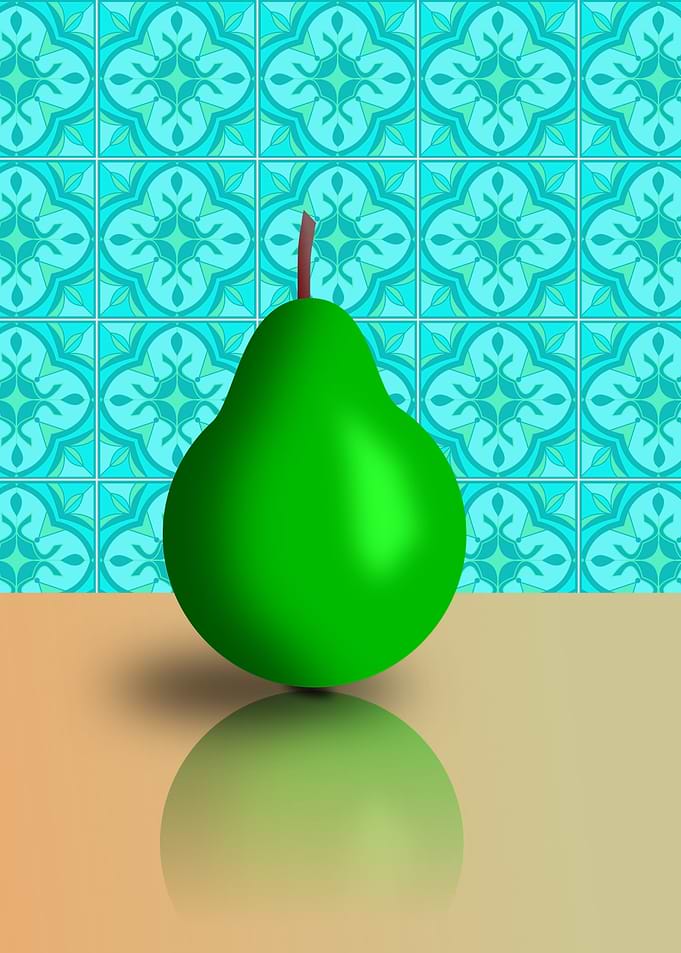 Green Pear on a Reflective Surface