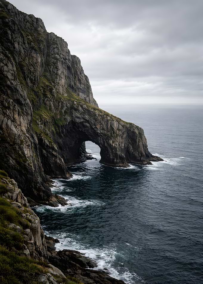 Sea Arch in Dramatic Coastal Cliffs