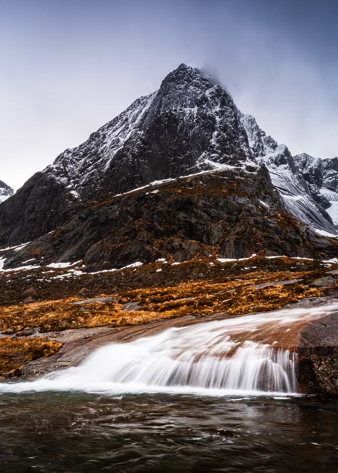 Snow-Capped Mountain and Waterfall