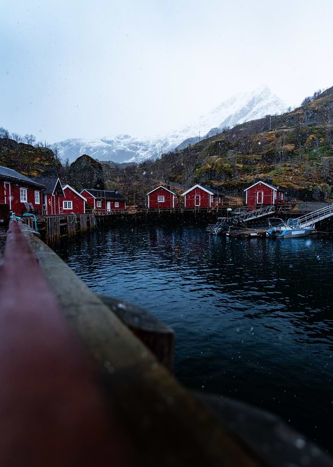 Red Fishing Huts in Snowy Norway