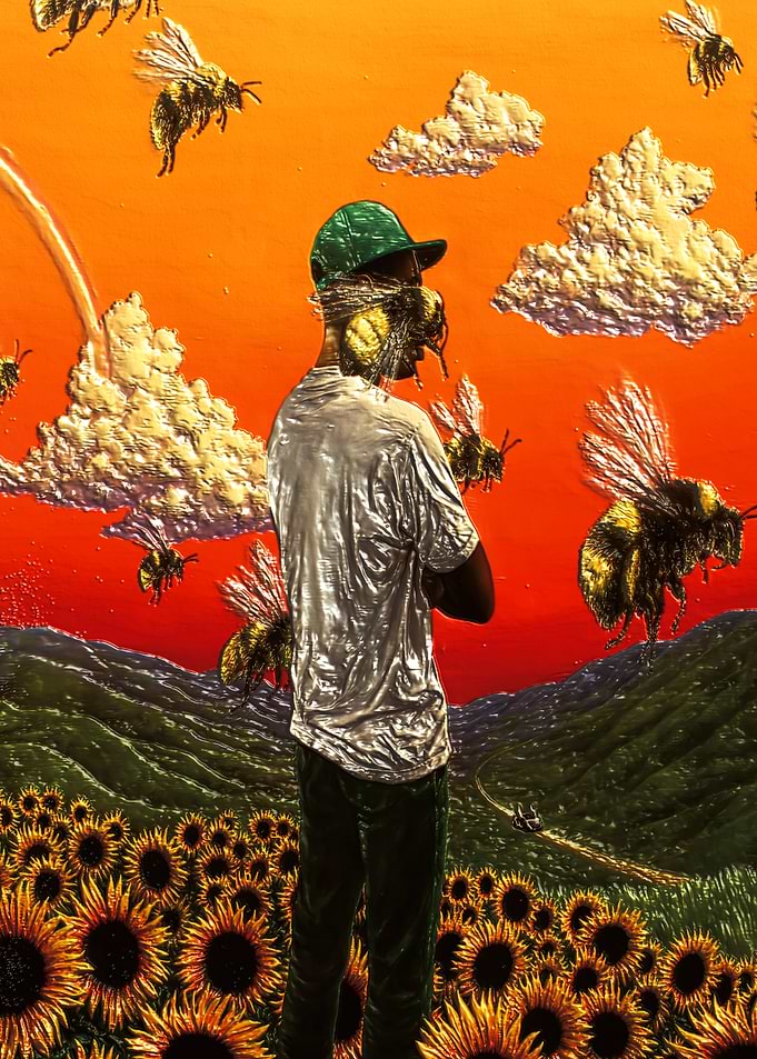 Man in Sunflower Field with Bees