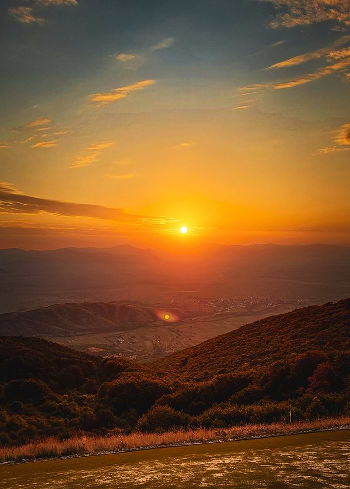 Sunset over mountain valley