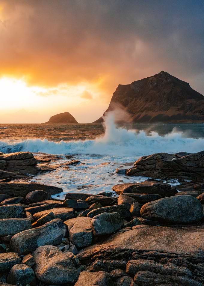 Dramatic Sunset Over Rocky Coastline