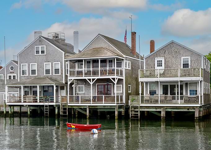 Waterfront Houses with Red Boat