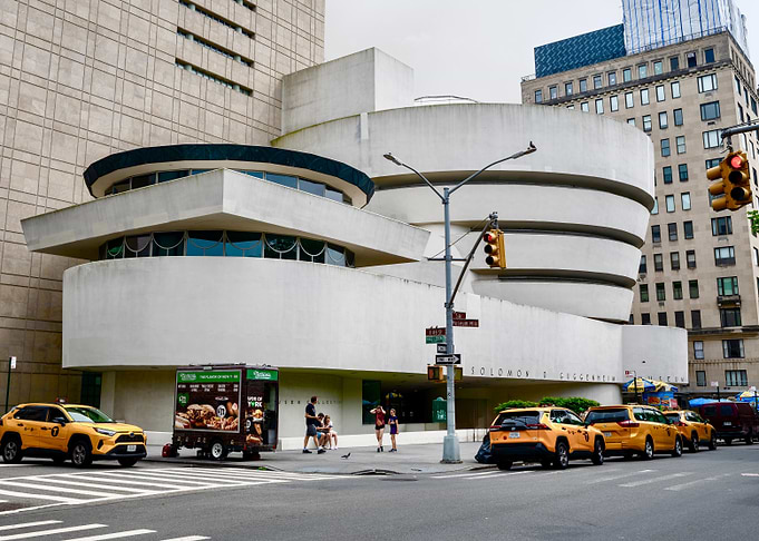 Guggenheim Museum with Yellow Taxis