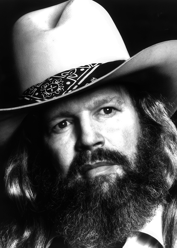 Close-up of a man in a cowboy hat