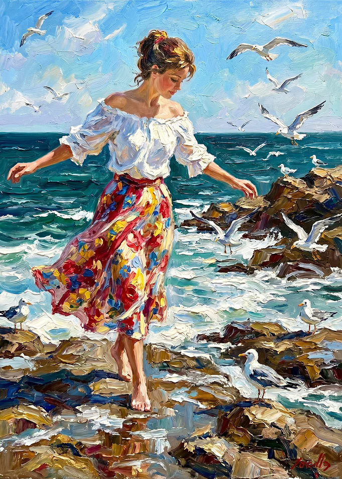 Woman feeding seagulls by the sea