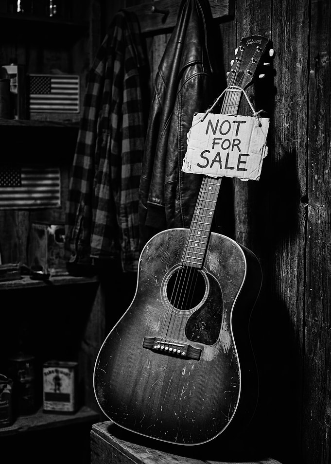 Acoustic Guitar with 'Not For Sale' Sign