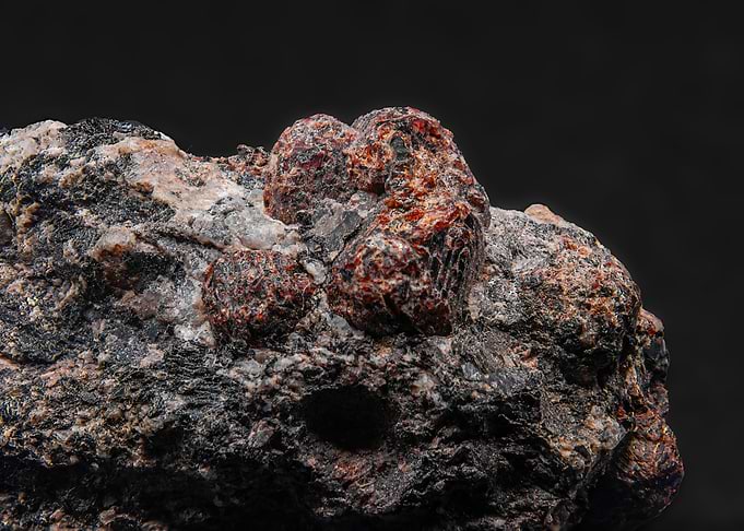 Garnet Crystals on Rock