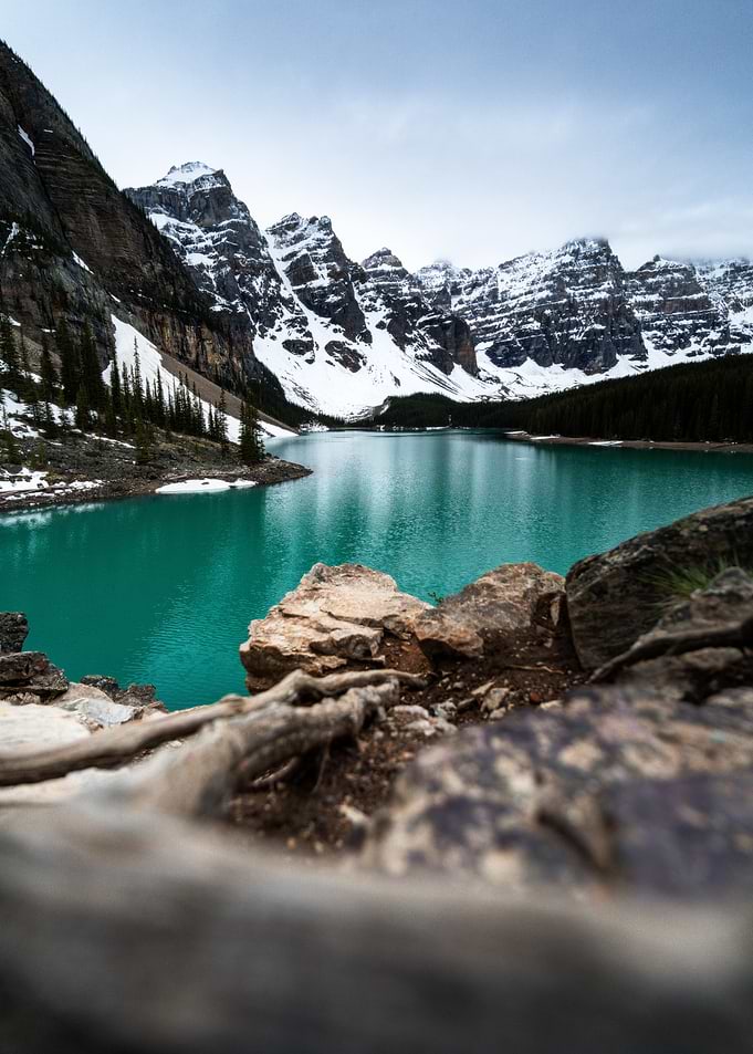 Turquoise Lake and Snow-Capped Mountains