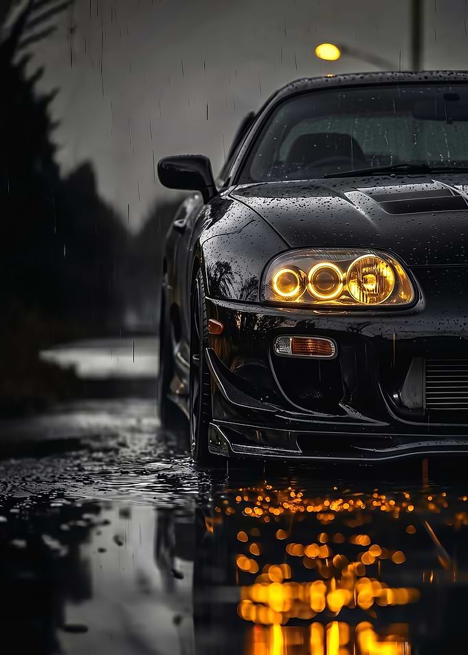 close up Black supra mk4 car in the rain