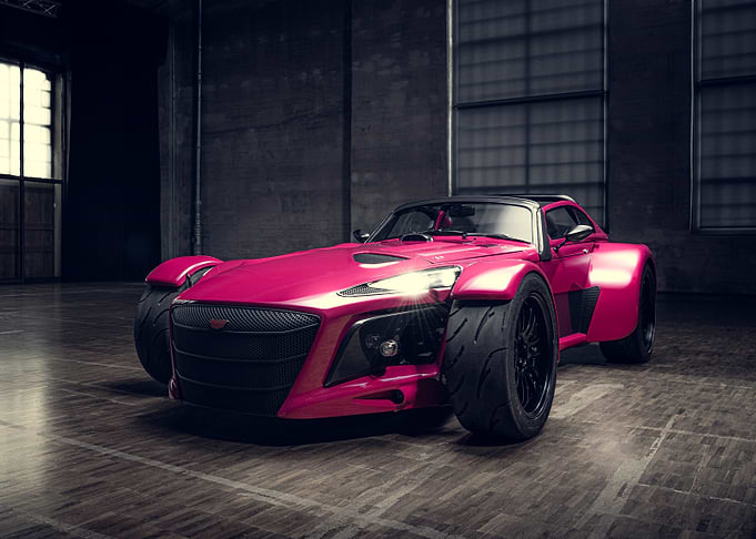 Pink Sports Car in Industrial Setting