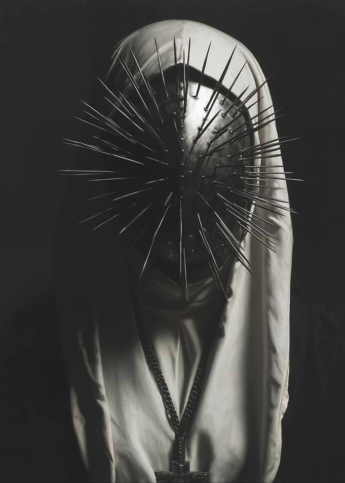 Spiked Masked Figure with Cross Necklace