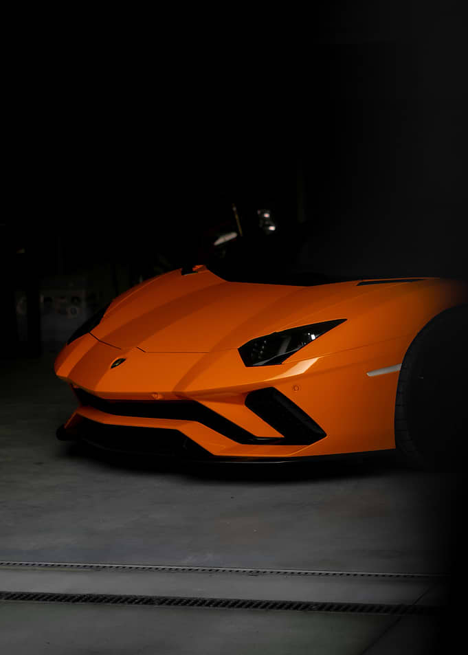 Orange Lamborghini Aventador SVJ Roadster