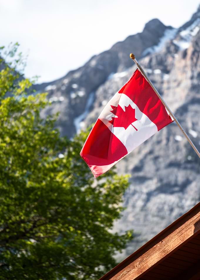 Canadian Flag in Mountains