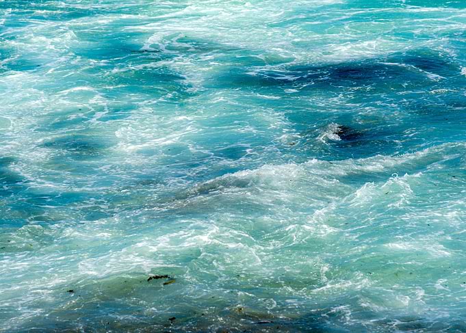 Turbulent Blue Water Surface