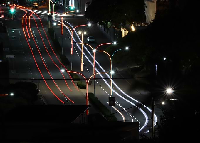 Nighttime City Street with Light Trails