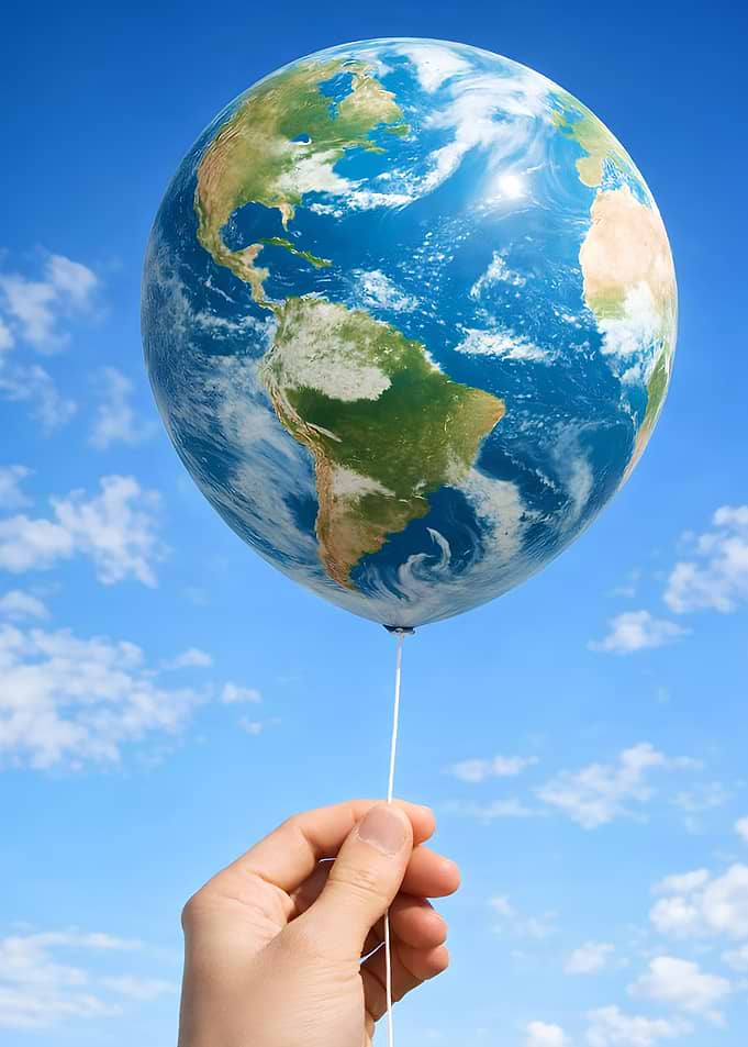 Earth Balloon Held by Hand