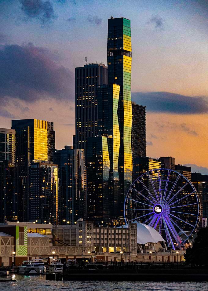 Cityscape at Dusk with Ferris Wheel