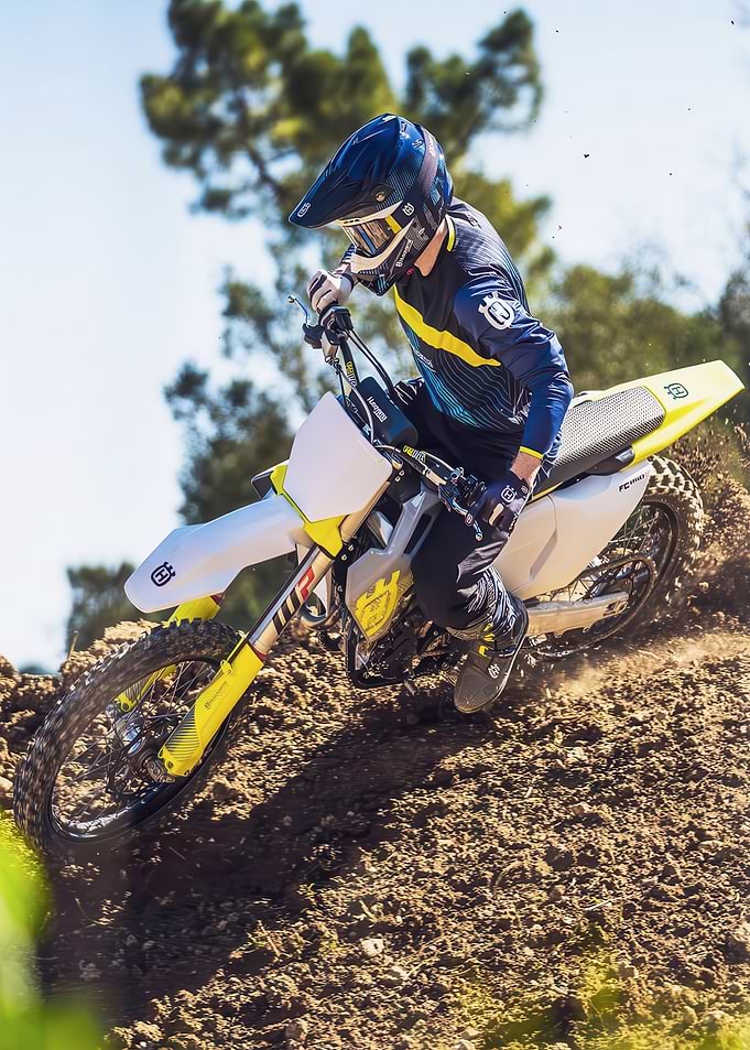 Motocross Rider on Dirt Track
