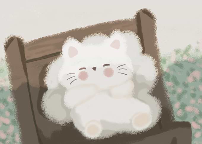 Cute Cat Relaxing on a Chair