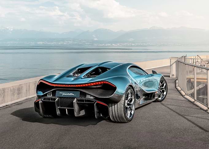 Futuristic Blue Sports Car by the Water