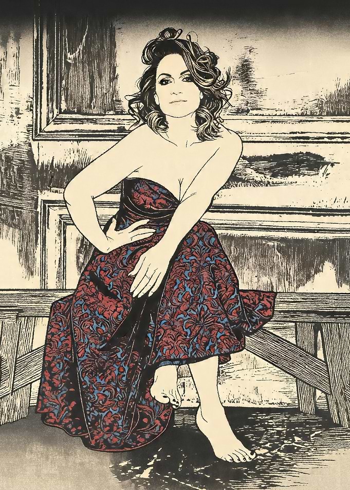 Woman in patterned dress sitting